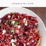 raw beet salad in a white bowl