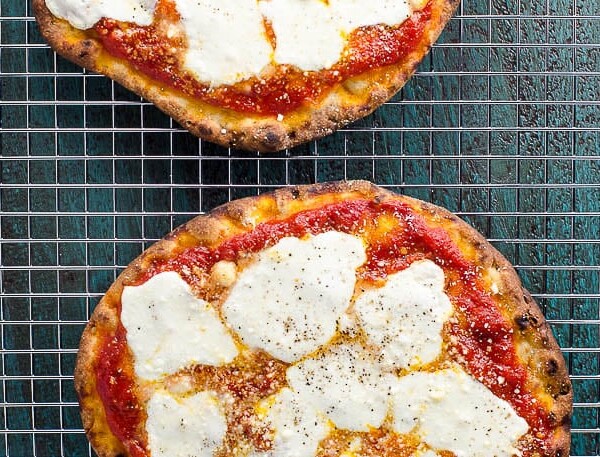 naan pizza on a cooling rack