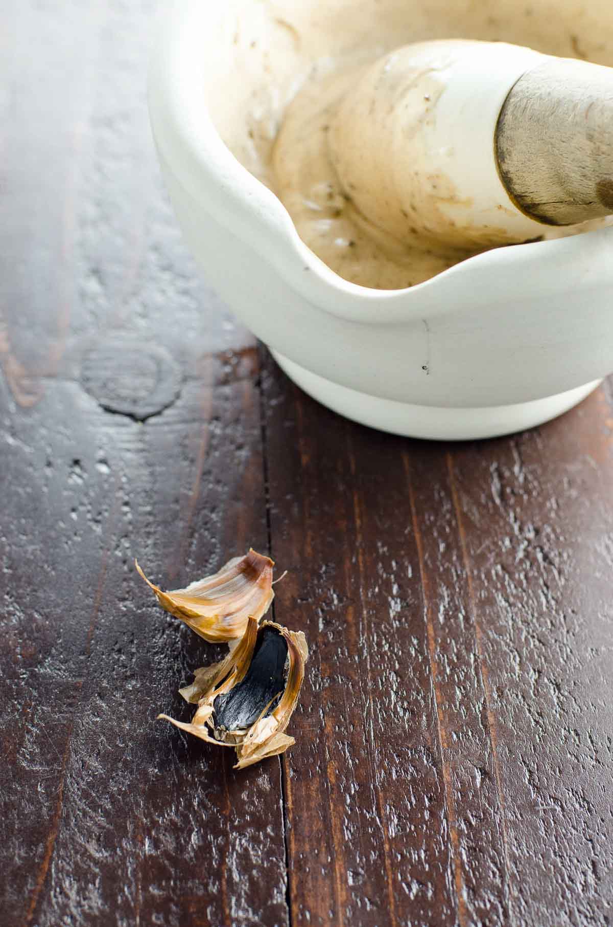black garlic mayo in a mortar and pestle