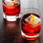two glasses each containing a negroni italian aperitif