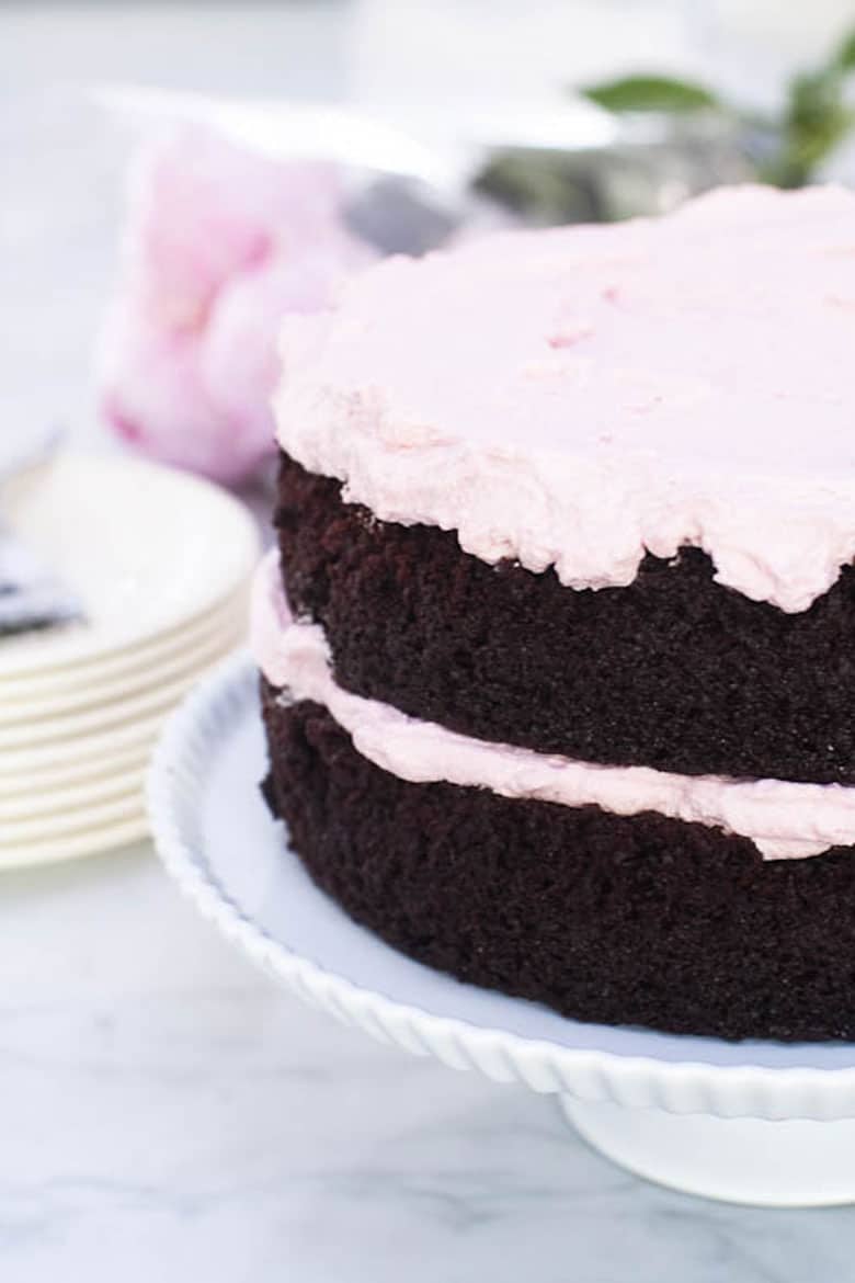 Raspberry whipped cream on a chocolate cake