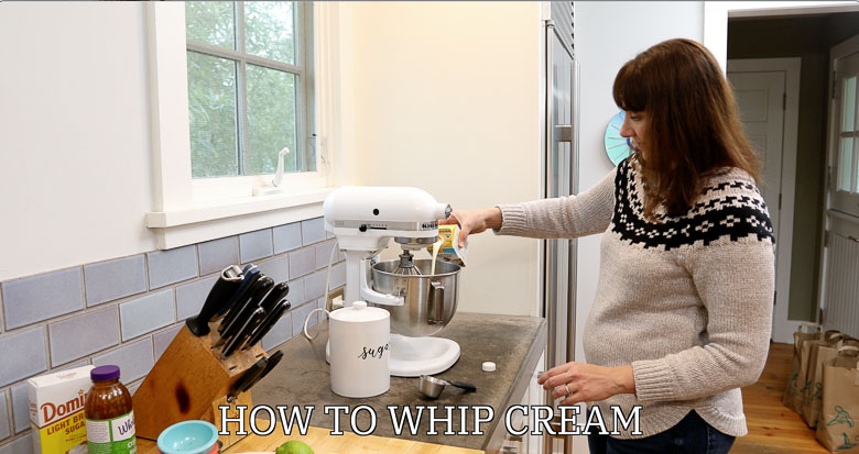 Pouring heavy cream into stand mixer for whipped cream
