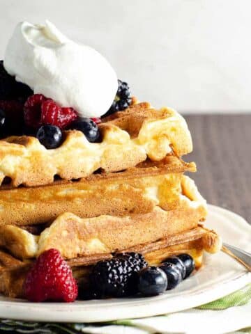 waffles with berries and cream whipped to soft peaks