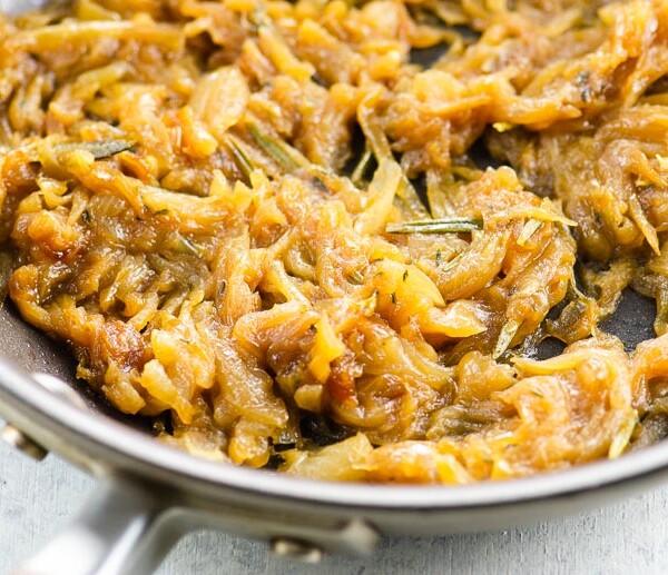 Skillet full of perfect, golden-brown caramelized onions