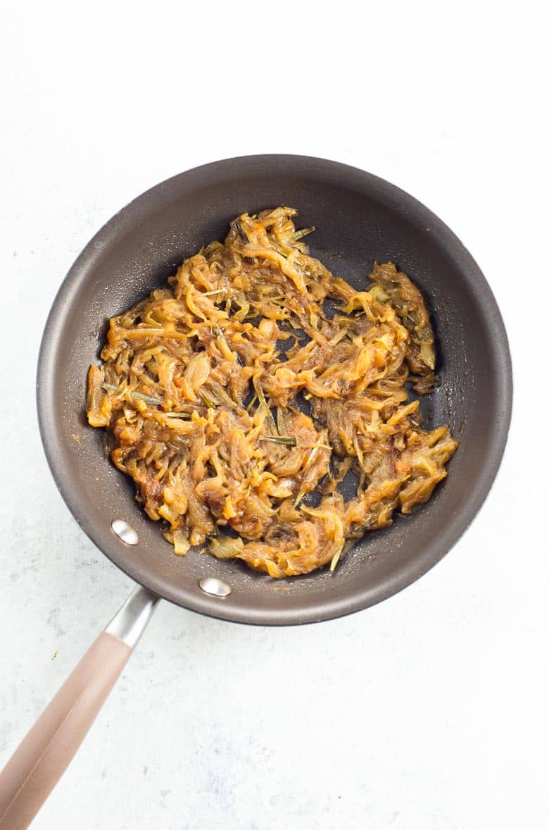 Perfectly jammy caramelized onions in a frying pan