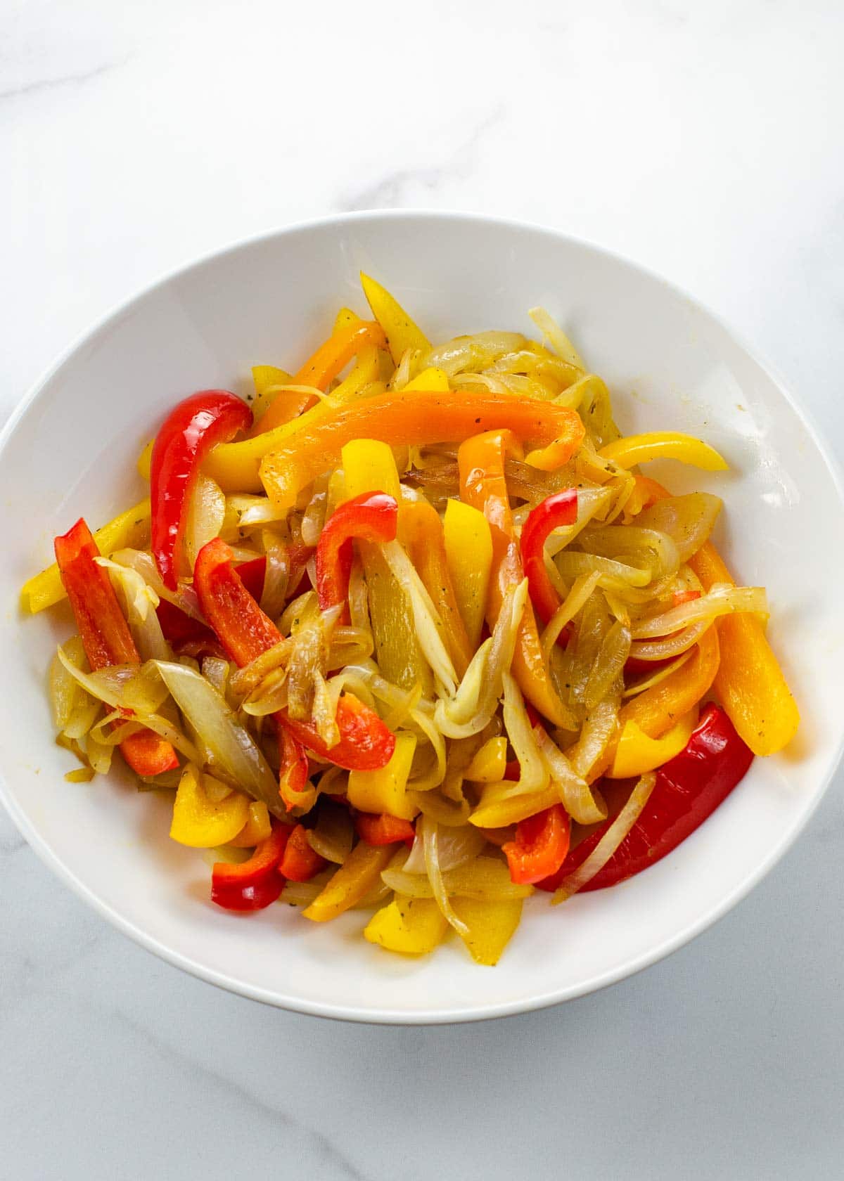 sauteed peppers and onions in a bowl