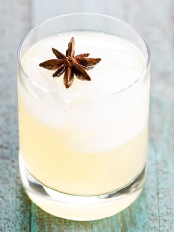 The Dreamcatcher blanco tequila cocktail with chartreuse in a rocks glass garnished with star anise