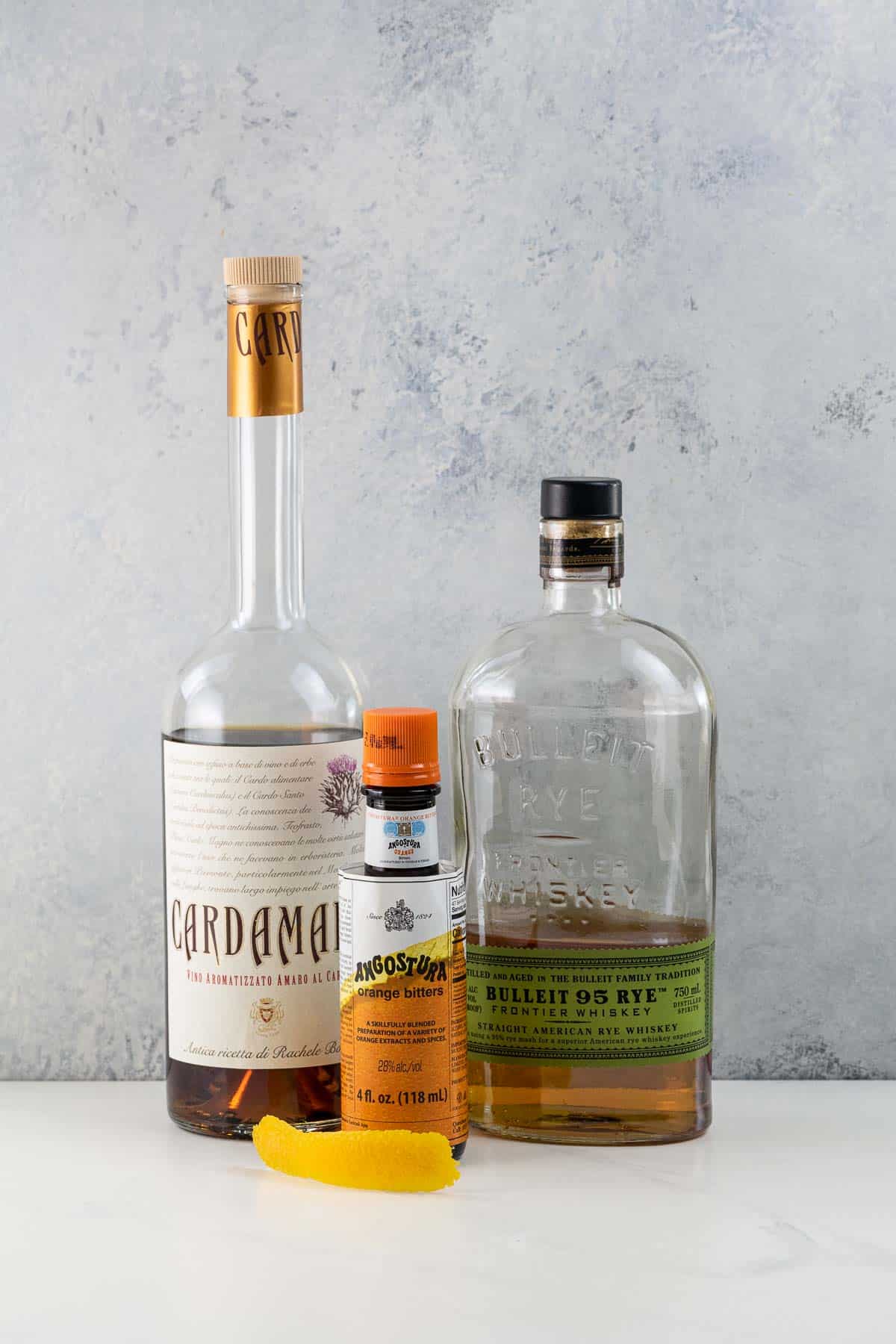 rye whiskey, cardamaro vino amaro, orange bitters, and an orange twist for a corduroy cocktail