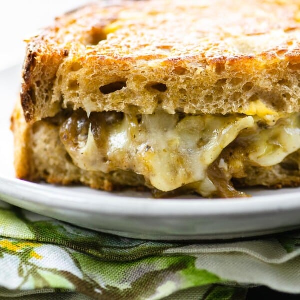 french onion grilled cheese on a plate with a napkin
