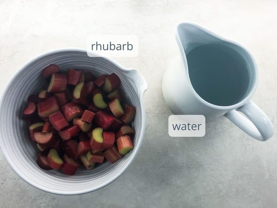 a bowl of sliced rhubarb stalks and a pitcher of water