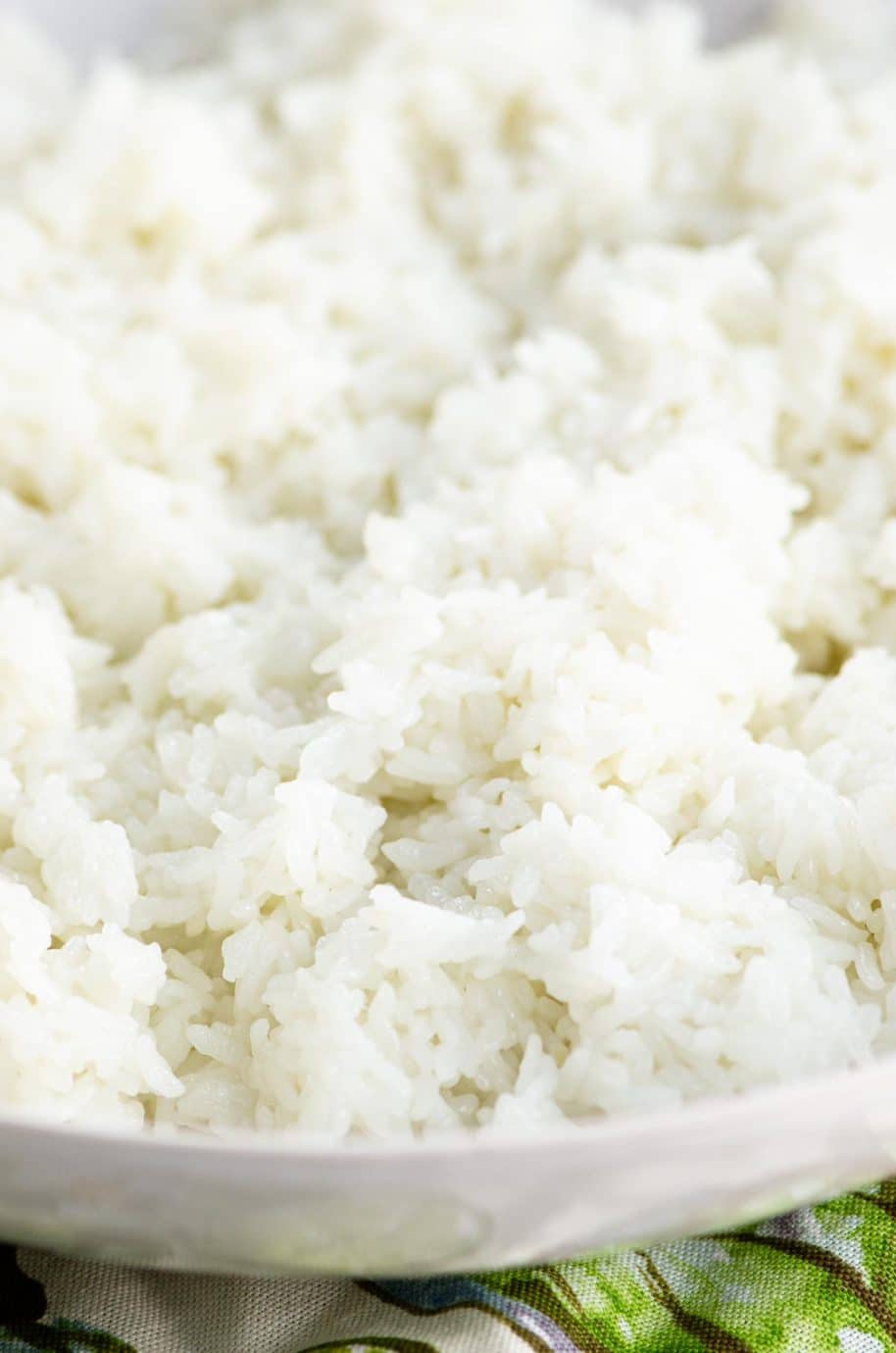 instant pot sushi rice in a white bowl on a napkin