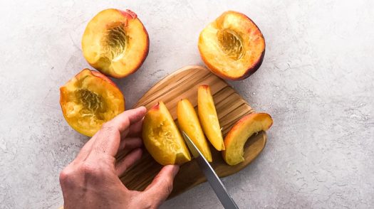 cutting a peach