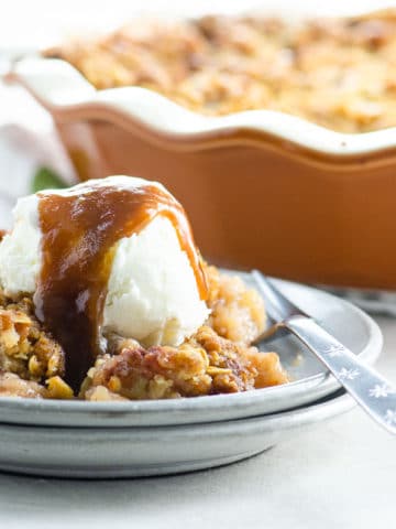 Best Old Fashioned Apple Crisp Recipe with ice cream and bourbon caramel sauce