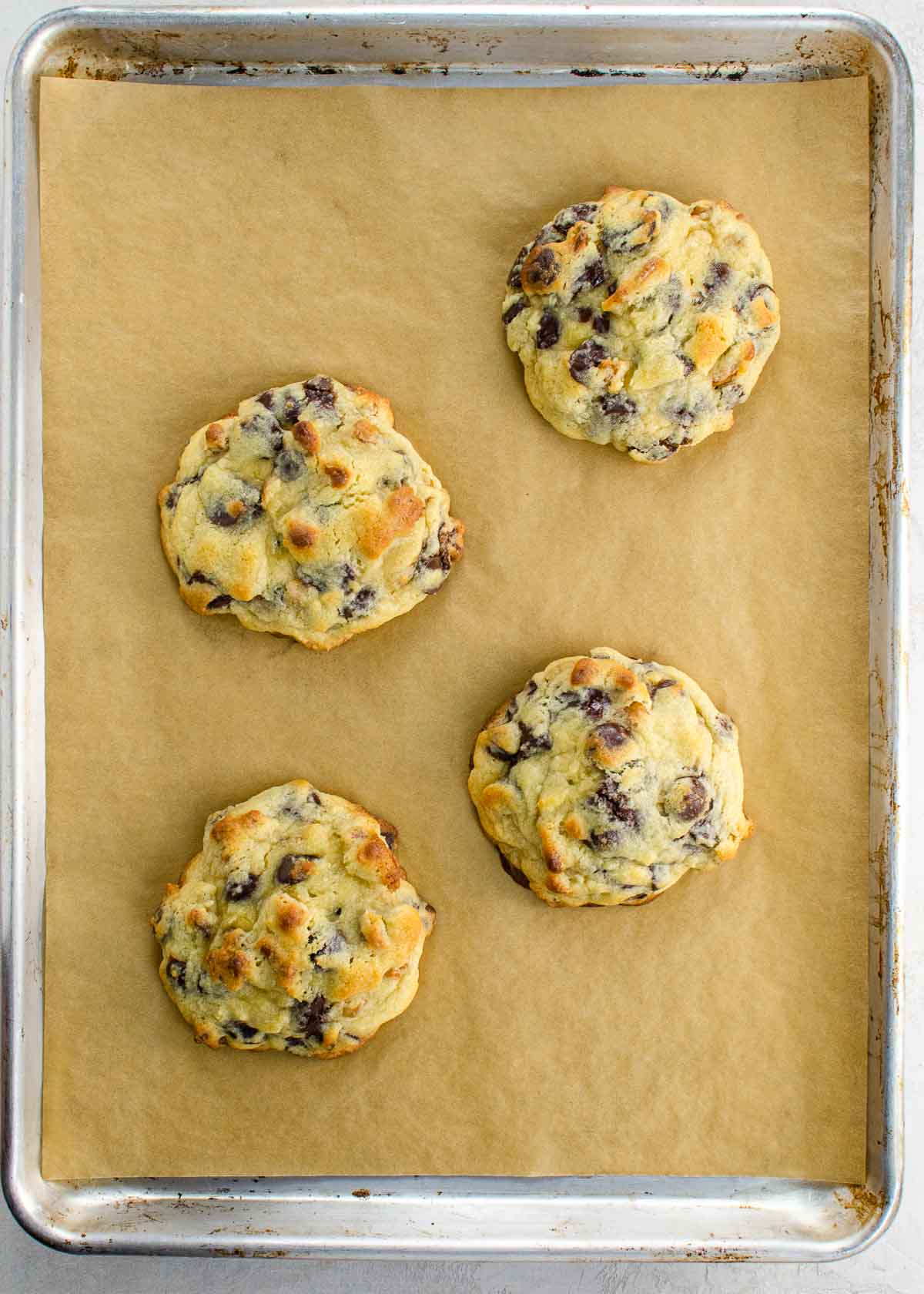 Levain Chocolate Chip Cookies on a Sheet Pan