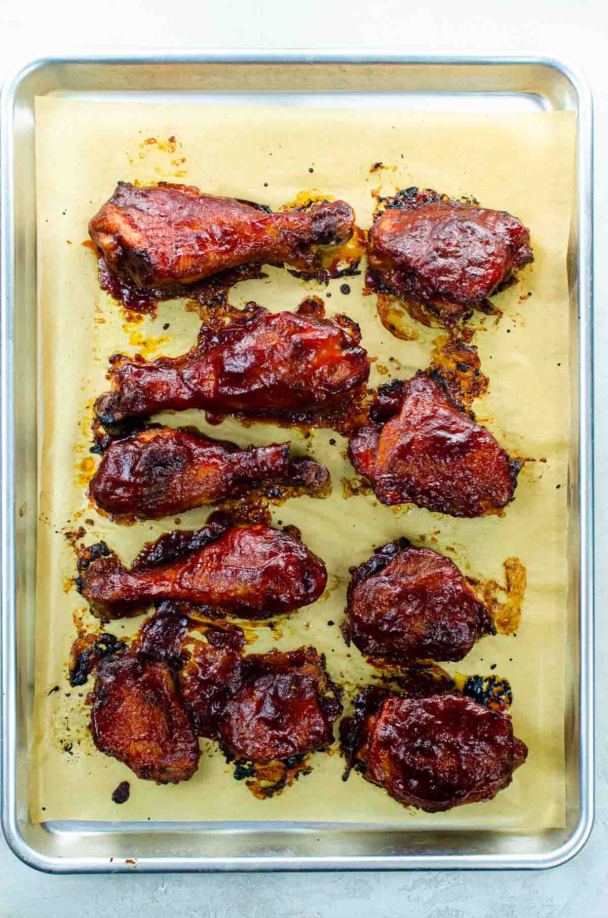 Baked BBQ Chicken Thighs and Legs on a sheet pan