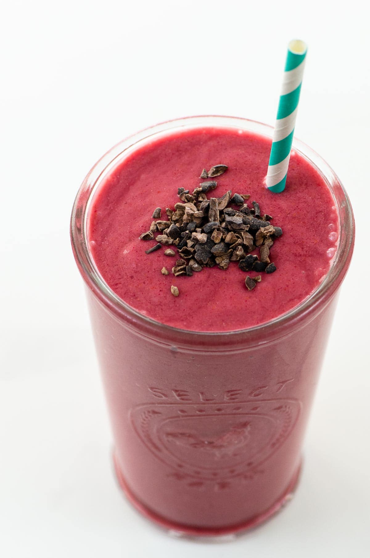 Smoothie basics raspberry banana smoothie with a paper straw