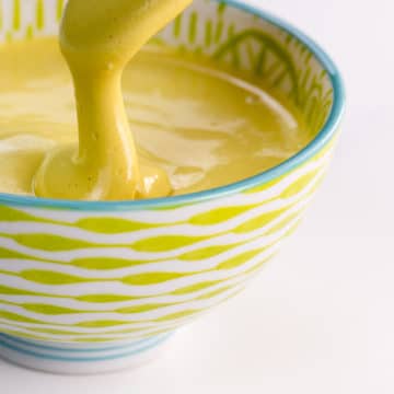 vegan cheese sauce in a pretty bowl