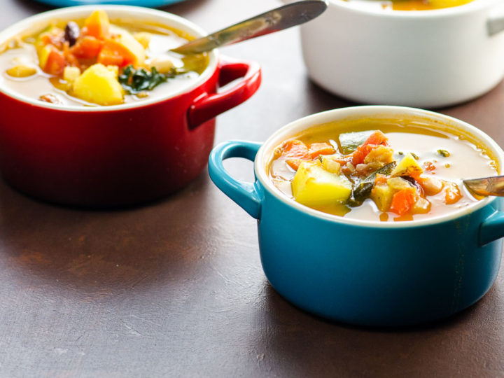 Vegan minestrone soup in mini le creuset pots