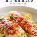 lobster poached in butter over linguine in a bowl