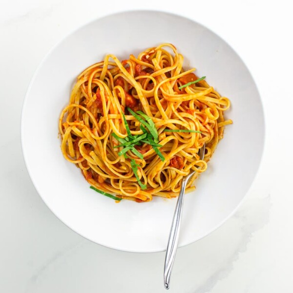spaghetti al pomodoro in a white bowl (actually linguine)
