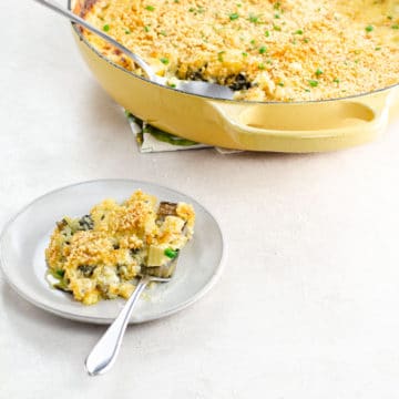 swiss chard gratin on a small plate with a fork