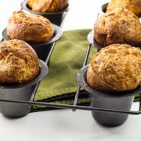 popovers from our easy popover recipe in a pan with a green napkin