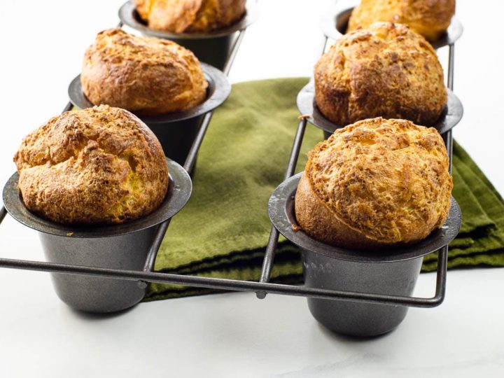 popovers from our easy popover recipe in a pan with a green napkin