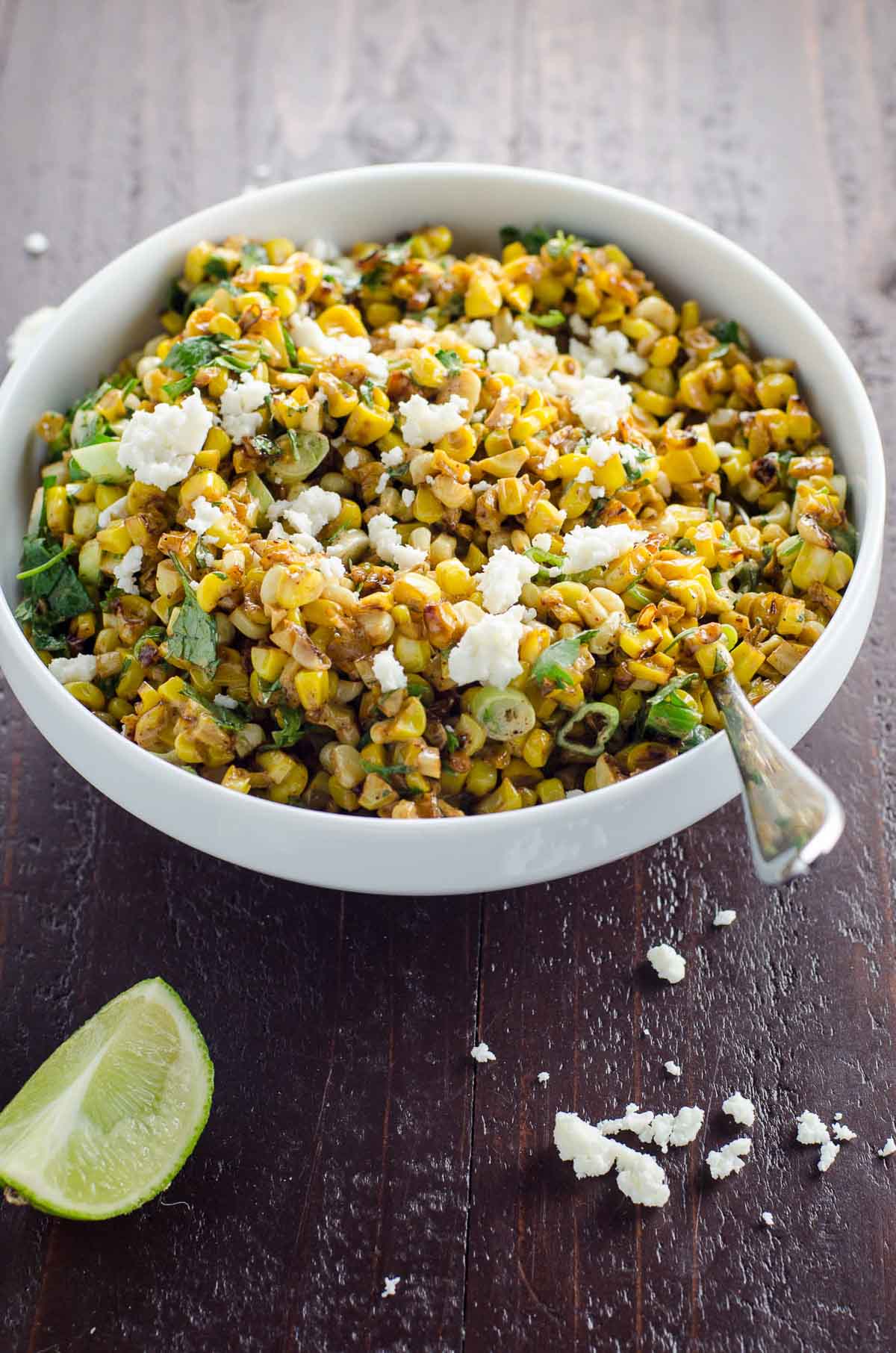 esquites (mexican street corn salad) in a white bowl