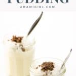 classic vanilla pudding with whipped cream and chocolate shavings in two jam jars with spoons