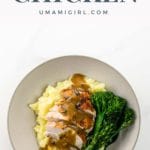 sliced spatchcock chicken breast with gravy over mashed potatoes with broccolini in a bowl
