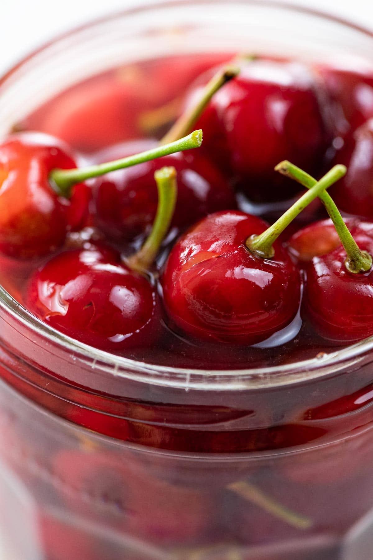 homemade maraschino cherries in a glass jar