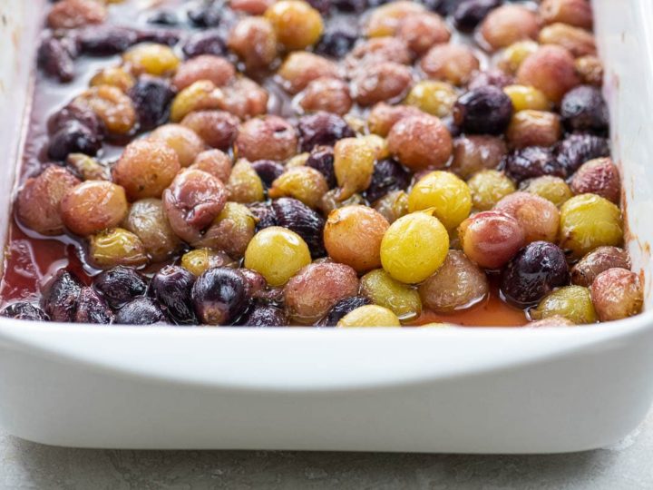 roasted grapes in a white pan