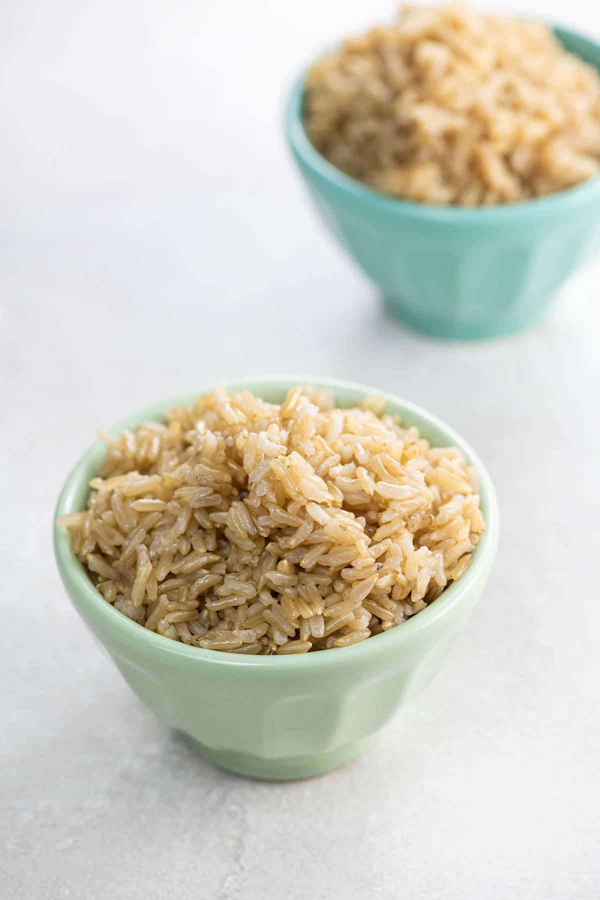 basmati brown rice in two small bowls