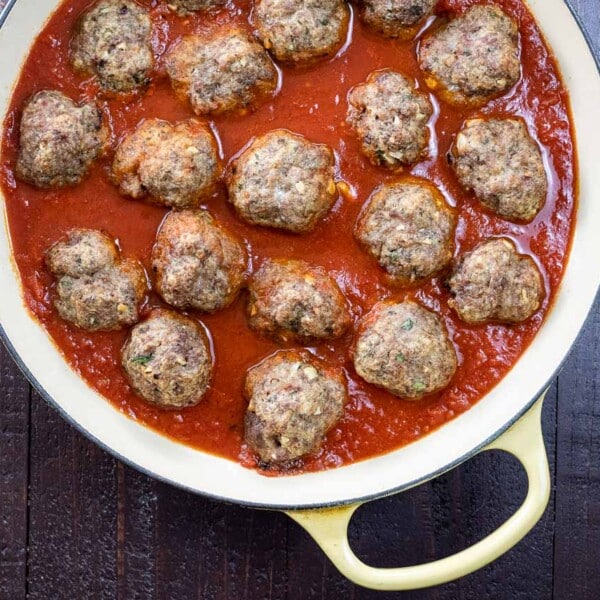Grandma's Italian meatballs with tomato sauce in a pan