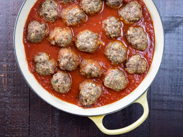Grandma's Italian meatballs with tomato sauce in a pan
