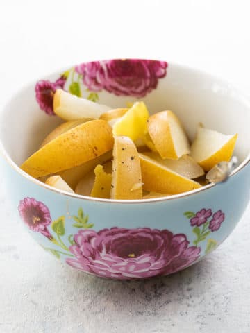 a decorative bowl of our poached asian pear dessert recipe