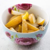 a decorative bowl of our poached asian pear dessert recipe
