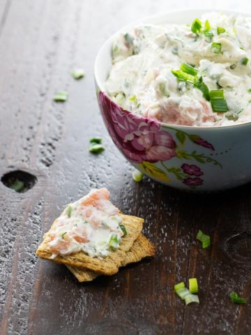 lox spread in a bowl and on crackers