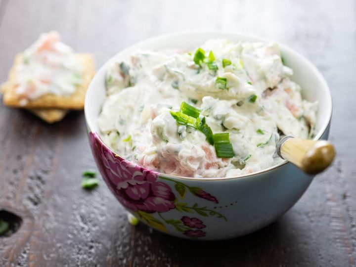 lox spread in a bowl and on crackers