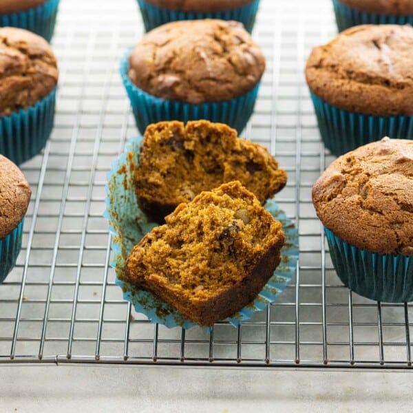 vegan pumpkin muffins on a cooling rack
