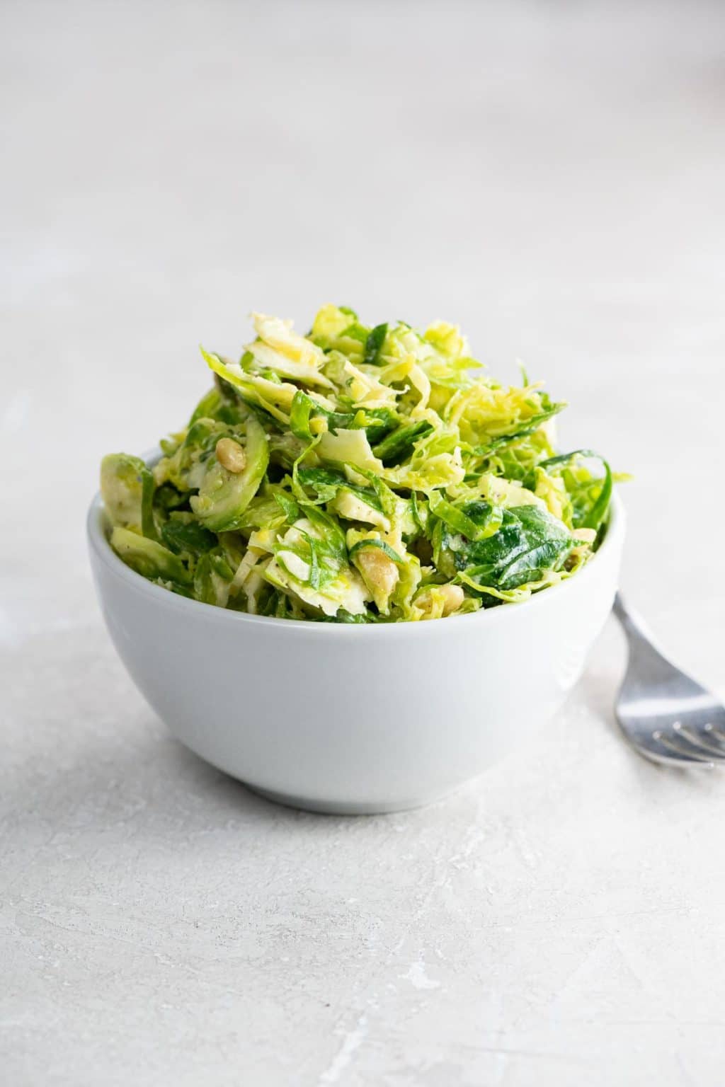 Shredded Brussels Sprouts Salad with Pecorino & Pine Nuts Umami Girl