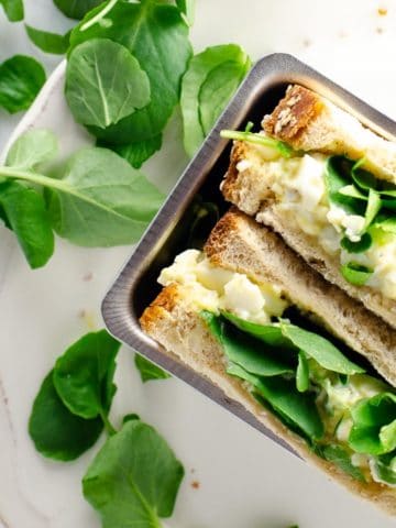 An egg and cress sandwich on a plate