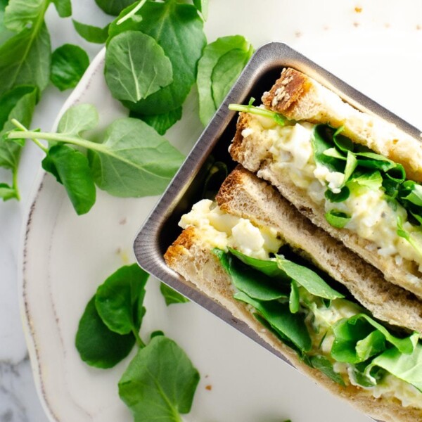An egg and cress sandwich on a plate