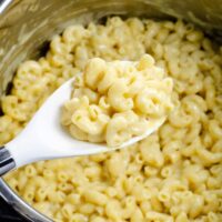 instant pot mac and cheese with a serving spoon