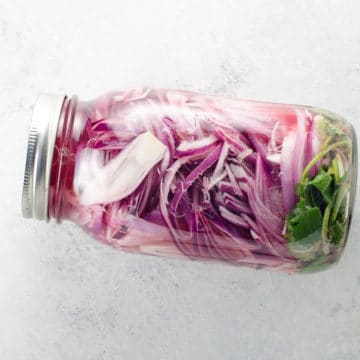 pickled red onions for mexican food in a mason jar
