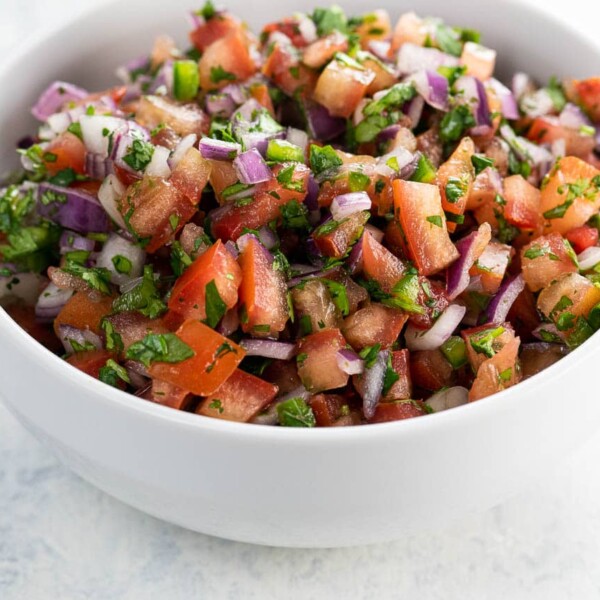 fresh tomato salsa (pico de gallo) in a white bowl