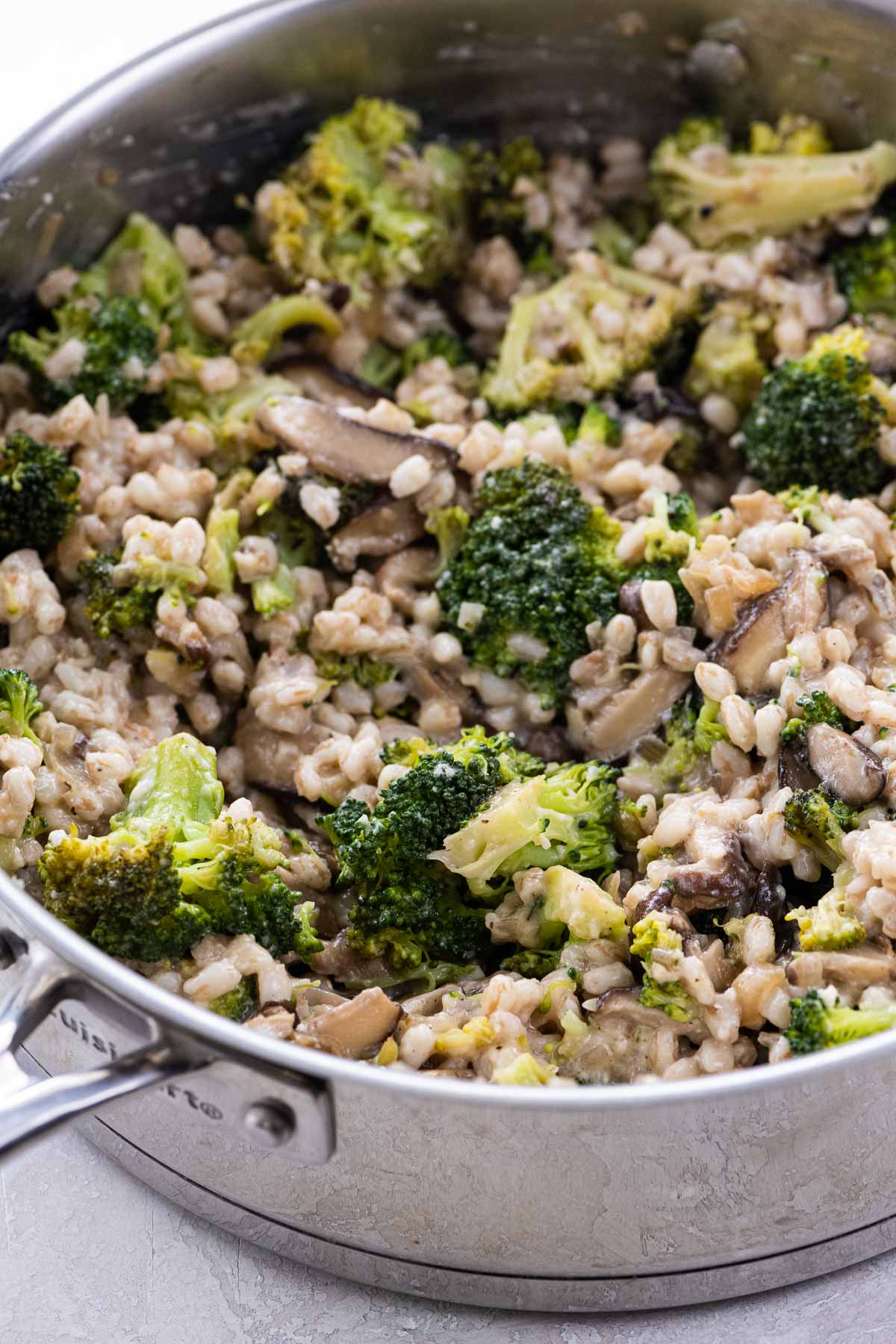 vegan farro recipe with broccoli and shiitakes in a pan