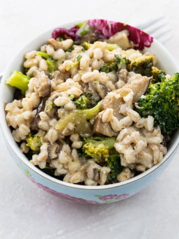 vegan farro recipe with broccoli and shiitakes in a bowl