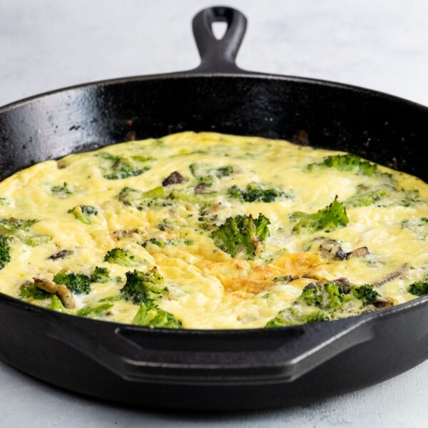 broccoli mushroom frittata in a cast iron pan