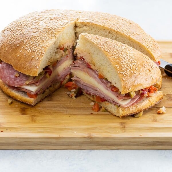 a classic muffaletta sandwich on homemade muffaletta bread